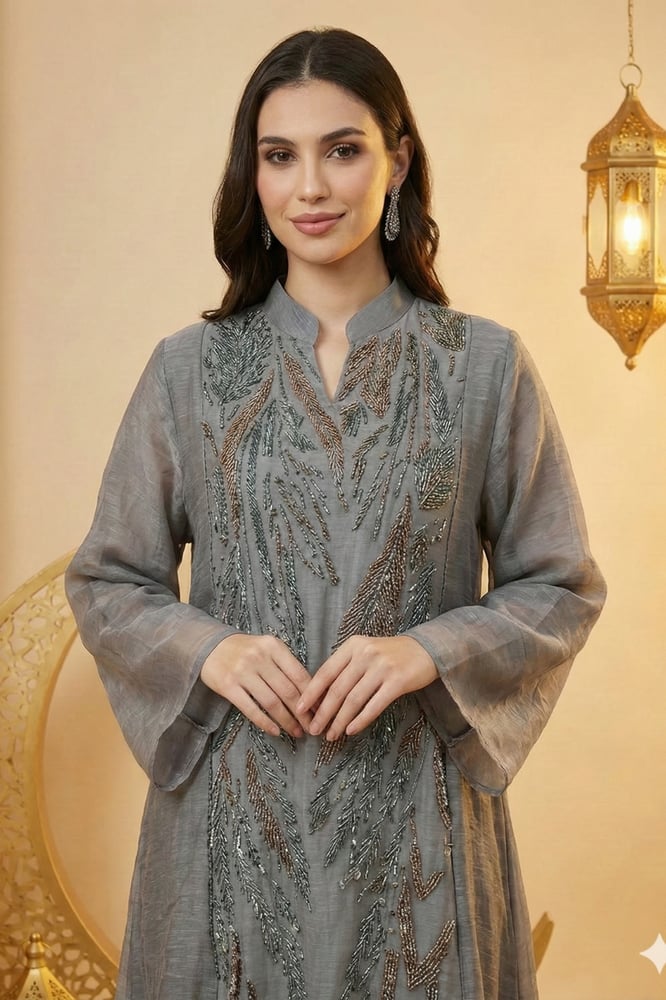 A Ramadan jalabiya embroidered with luxurious details from Rivan
