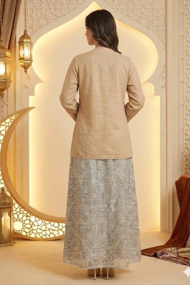 A Ramadan jalabiya with delicate embroidery and a comfortable fit from Rivan