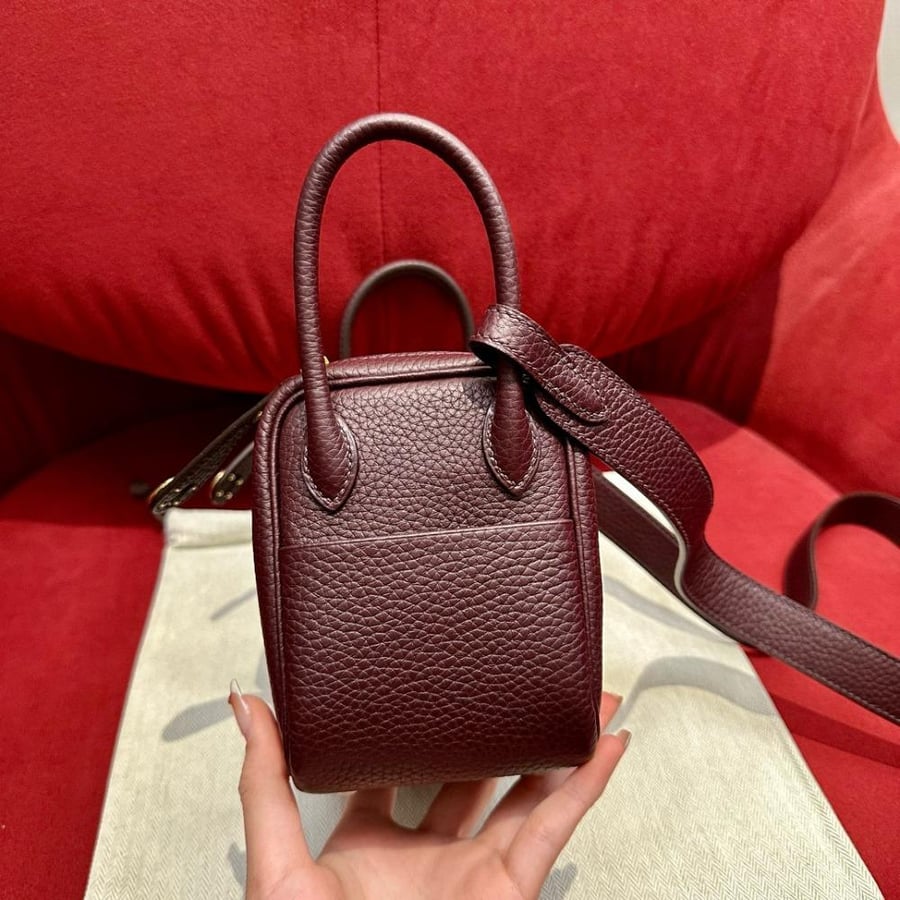 ارميز ليندي Lindy mini مقاس 19cm لون الهاردوير ذهبي لون الشنطه عنابي