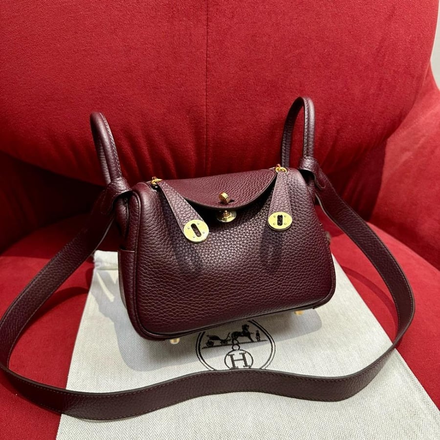 ارميز ليندي Lindy mini مقاس 19cm لون الهاردوير ذهبي لون الشنطه عنابي