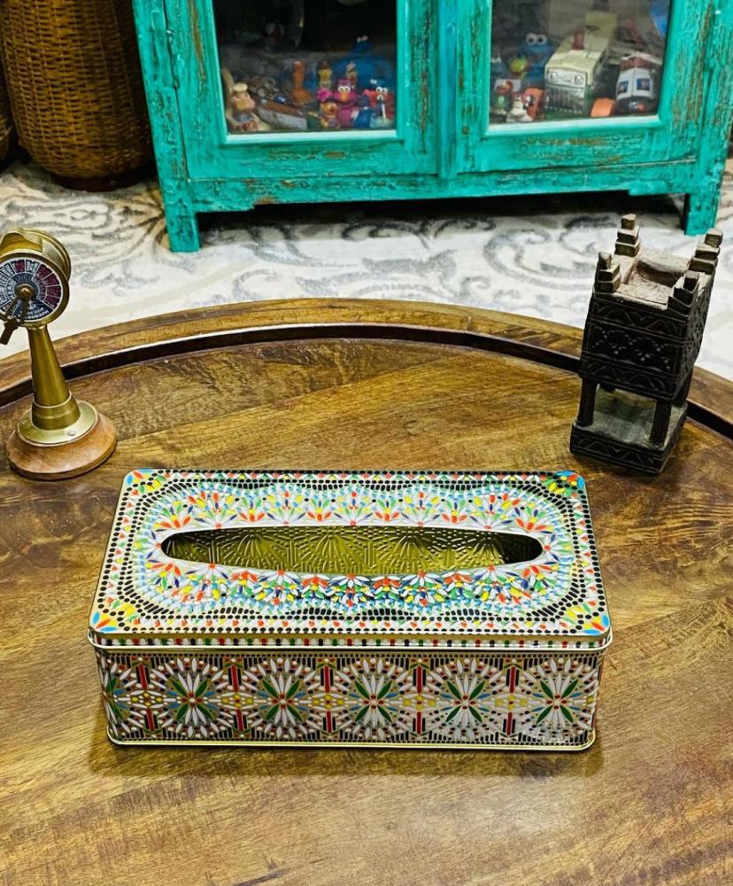 A tin box with beautiful engraved colored designs; was used to store tissue box; old, famous in the 1980s; stored in excellent condition, unused; made in Taiwan