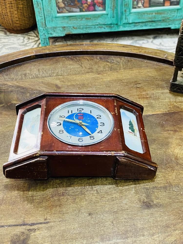 Among the rare items; a sewing clock decorated with wooden decor and views from the sides; the seconds at the end are a very elegant and clean airplane structure