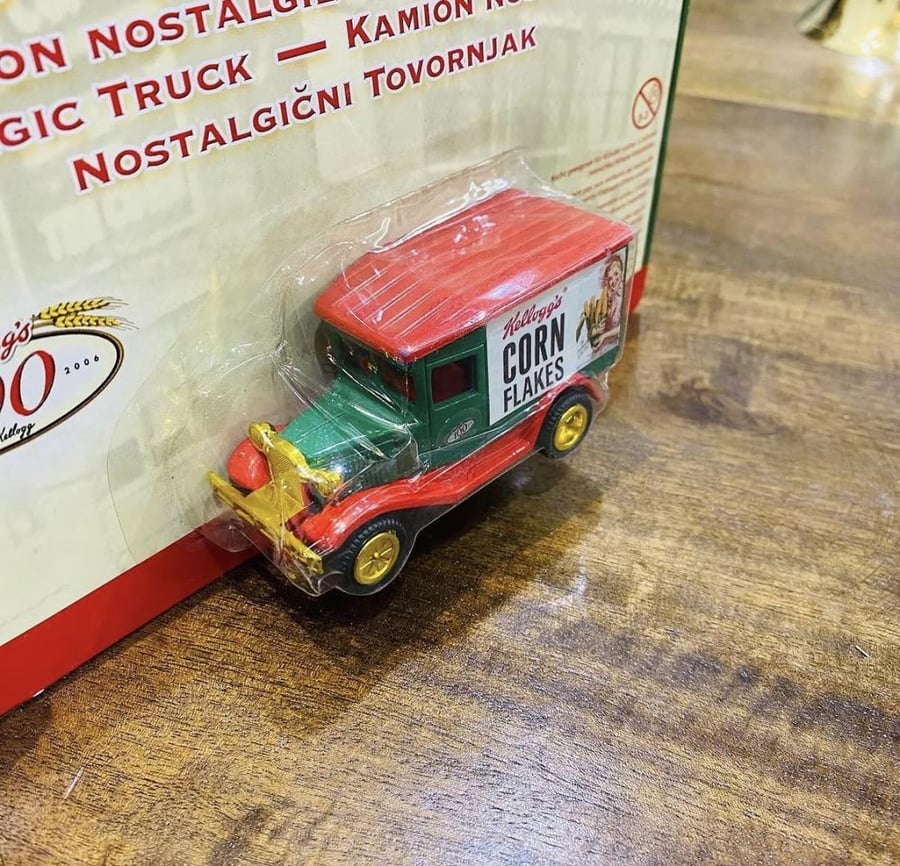 Among the distinguished items; a Corn Flakes car made of metal on the occasion of the 100th anniversary of the company's founding, which was in 2006, wrapped in the factory packaging and unused.