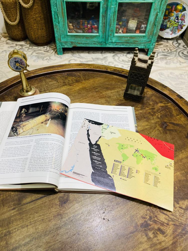 A very luxurious printed folder about Desert Storm; contains images shown for the first time; among the folder is a large foldable picture that includes all the fighters participating in this war.