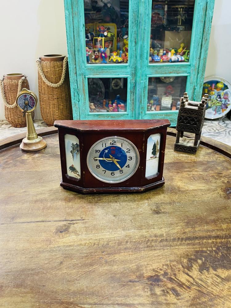 Among the rare items; a sewing clock decorated with wooden decor and views from the sides; the seconds at the end are a very elegant and clean airplane structure