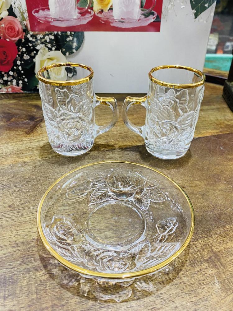 Among the rare items; a set of 6 cups and 6 decorated plates in gold, in addition to beautiful and elegant prominent roses; became famous in the early nineties, stored in excellent condition in the carton, unused; made in Japan