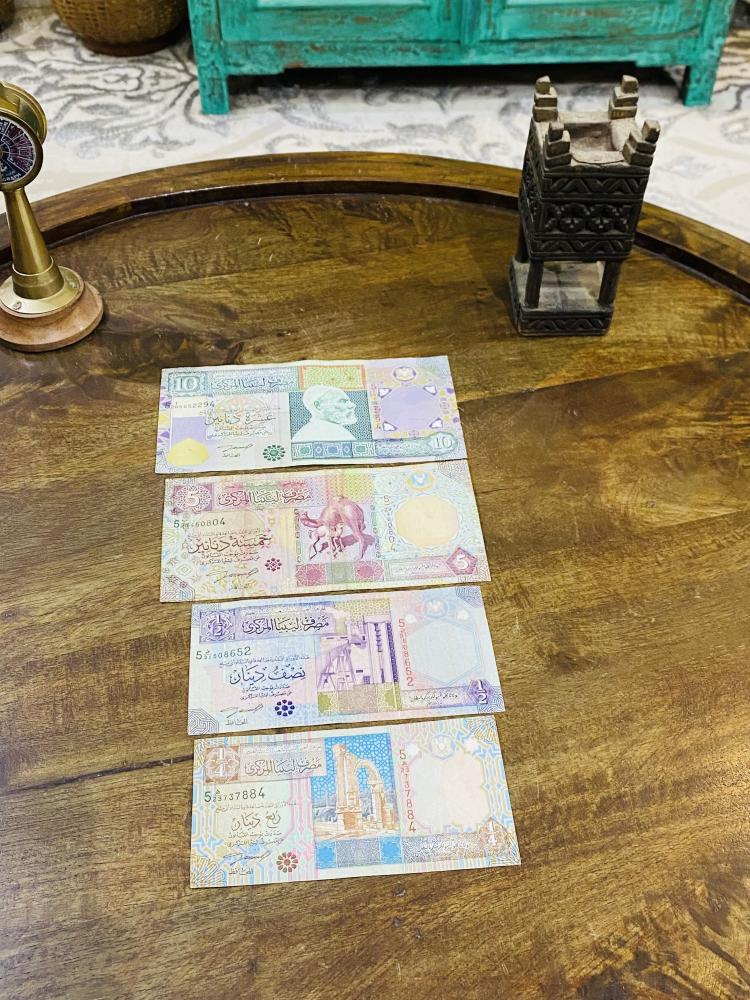 طقم ليبيا الإصدار الخامس فئة ١٠ و ٥ ونصف وربع دينار حالات جيدة جداً