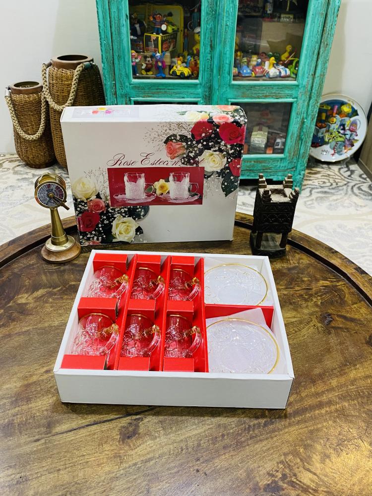 Among the rare items; a set of 6 cups and 6 decorated plates in gold, in addition to beautiful and elegant prominent roses; became famous in the early nineties, stored in excellent condition in the carton, unused; made in Japan