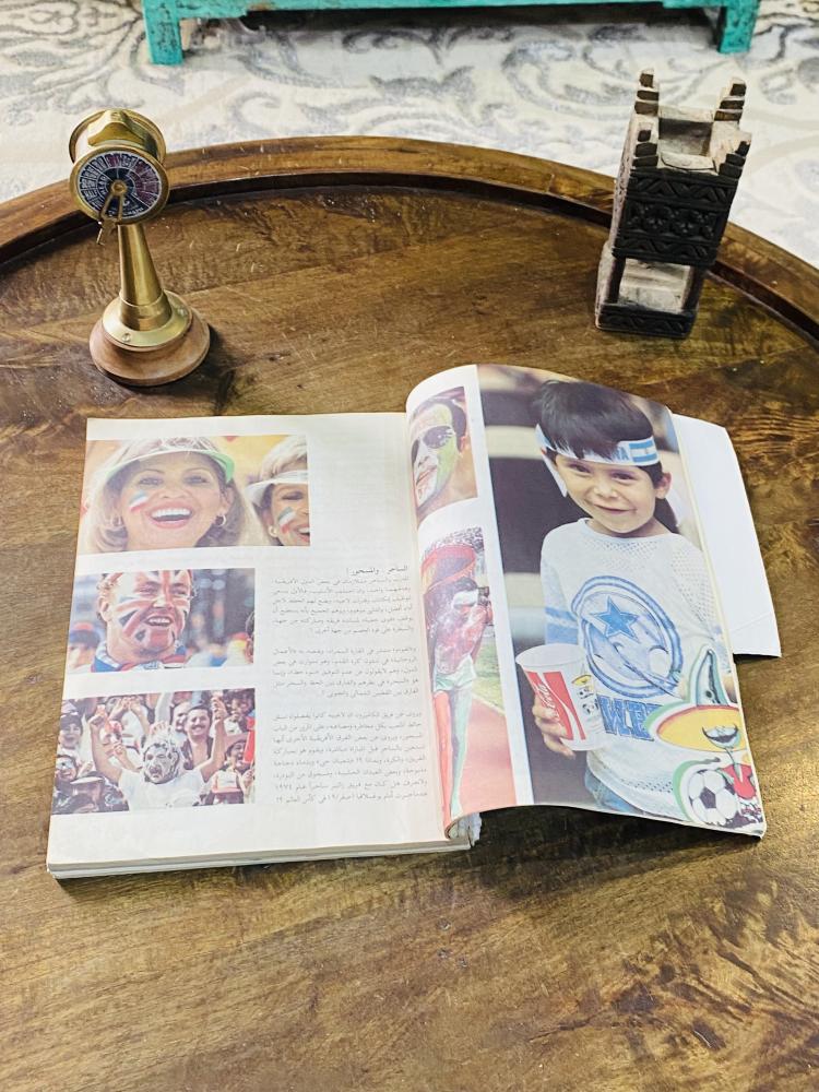 Among the rare items; a book titled "The Championship" (World Cup from 1930 AD to 1990 AD; very beautiful and contains many important sports topics) (the front cover has a tear at the bottom of the page as shown in the picture, but it does not affect the 