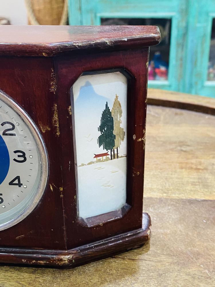 Among the rare items; a sewing clock decorated with wooden decor and views from the sides; the seconds at the end are a very elegant and clean airplane structure