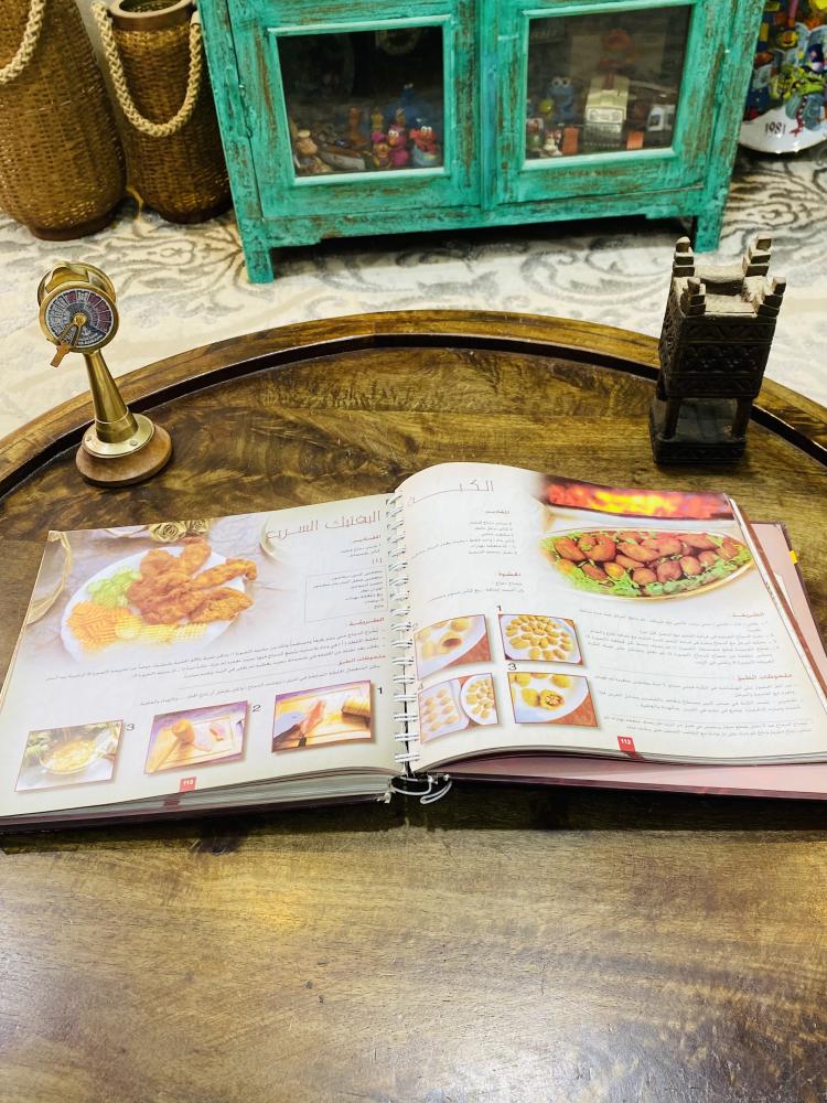 من البنود المميزة؛ كتاب نخبة الأطباق الشهير طبع عام ١٤٣٢هـ  ٢٠١١م