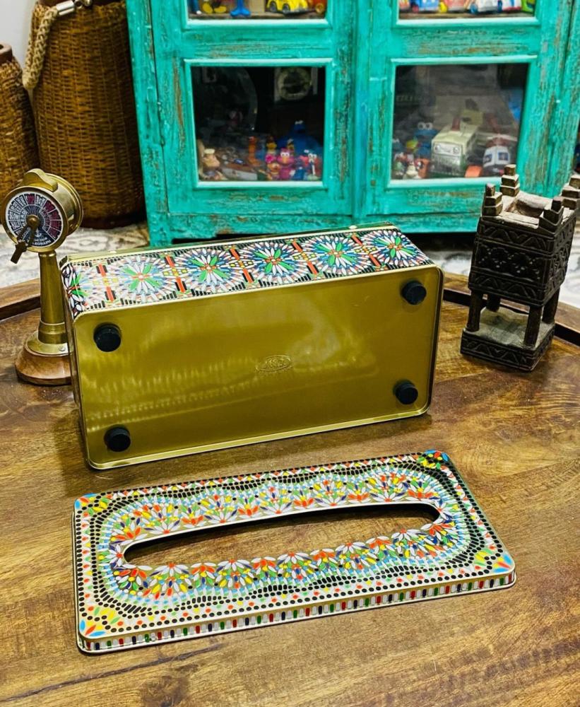 A tin box with beautiful engraved colored designs; was used to store tissue box; old, famous in the 1980s; stored in excellent condition, unused; made in Taiwan