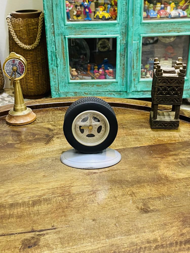 Among the rare items; a very beautiful office clock in the shape of a racing car cover (the pedal is from a pedal).