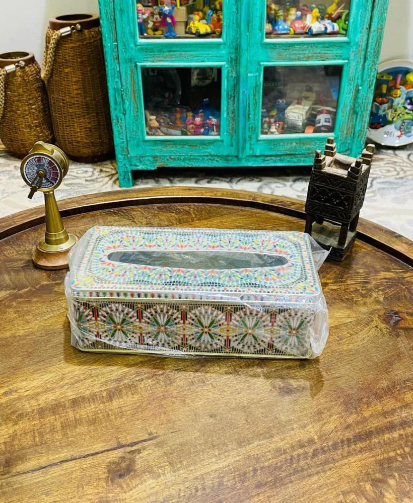A tin box with beautiful engraved colored designs; was used to store tissue box; old, famous in the 1980s; stored in excellent condition, unused; made in Taiwan