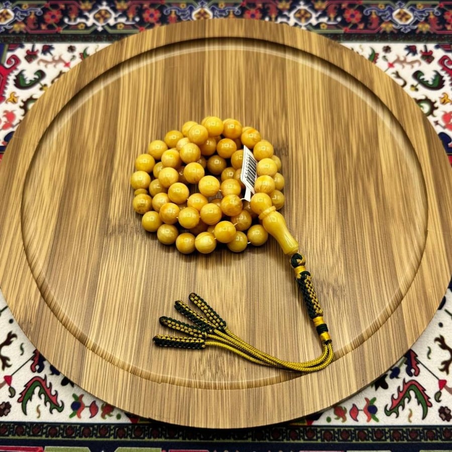 سبحة مسكي مشخّطة صفراء – 67 خرزة – خرز كروي – شرابة يدوية
