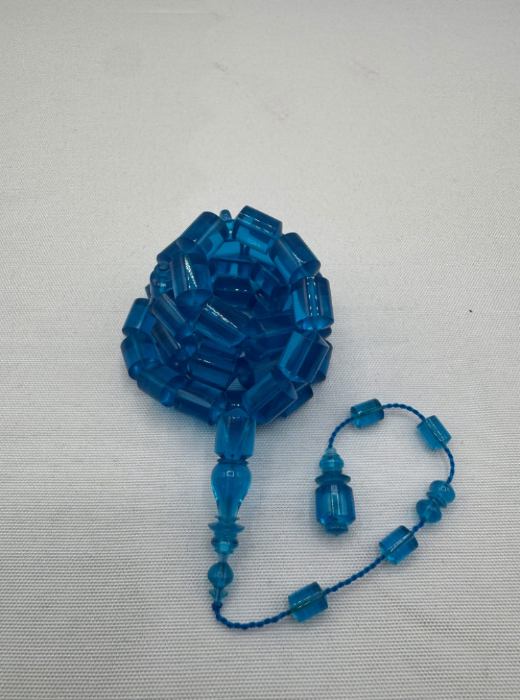 Blue transparent plastic prayer beads similar to cast