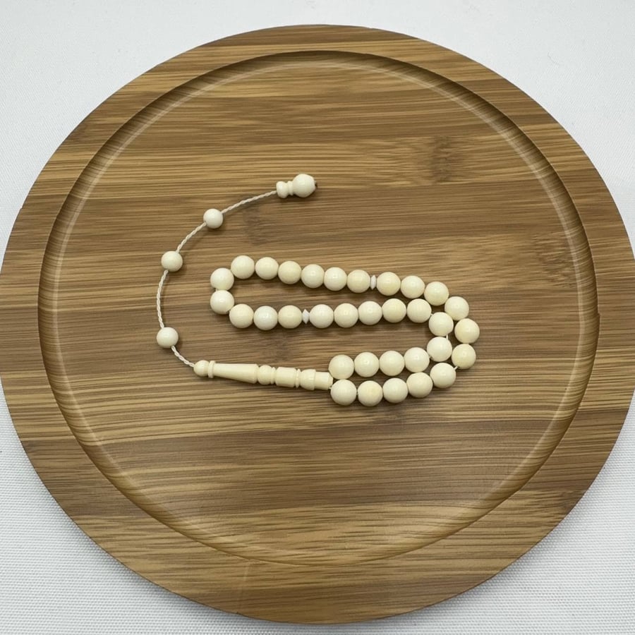 سبحة عظم جمل طبيعي ناعمة (33 خرزة) مع تمليكة يدوية