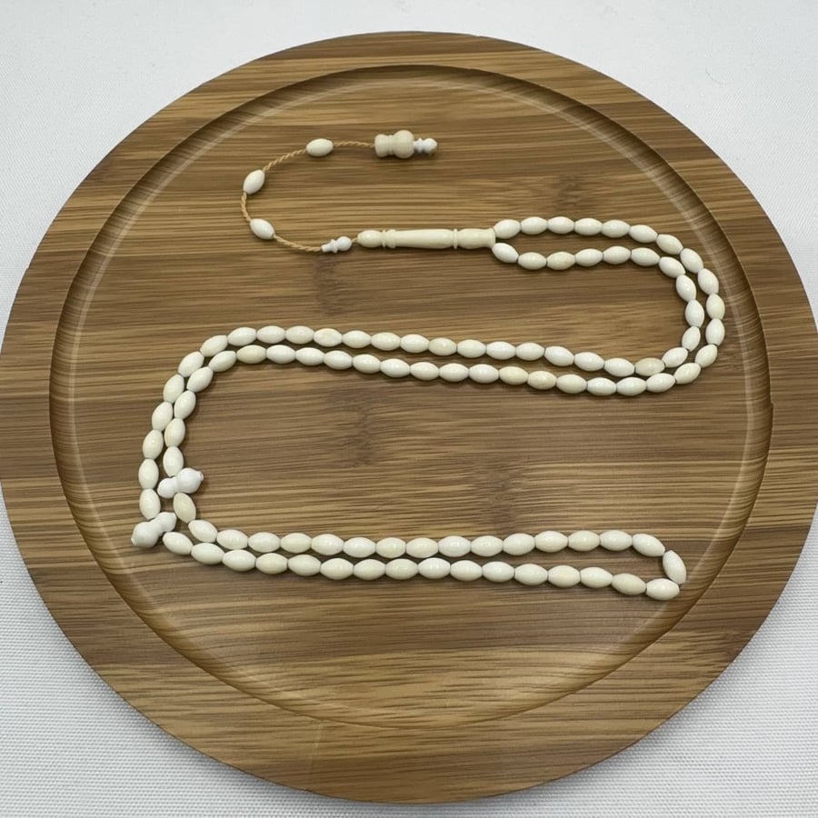 سبحة عظم جمل طبيعي ناعمة (99 خرزة) مع تمليكة حرفية