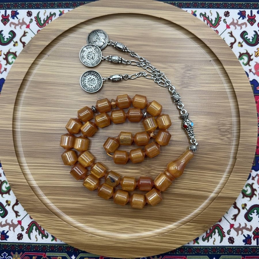 سبحة فاتوران عسلي ذهبي – 33 خرزة – قصة برميلية – شرابة ألتيمون