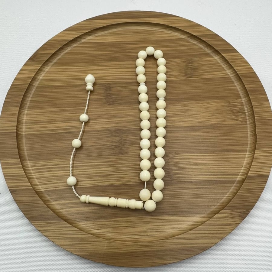 سبحة عظم جمل طبيعي ناعمة (33 خرزة) مع تمليكة يدوية