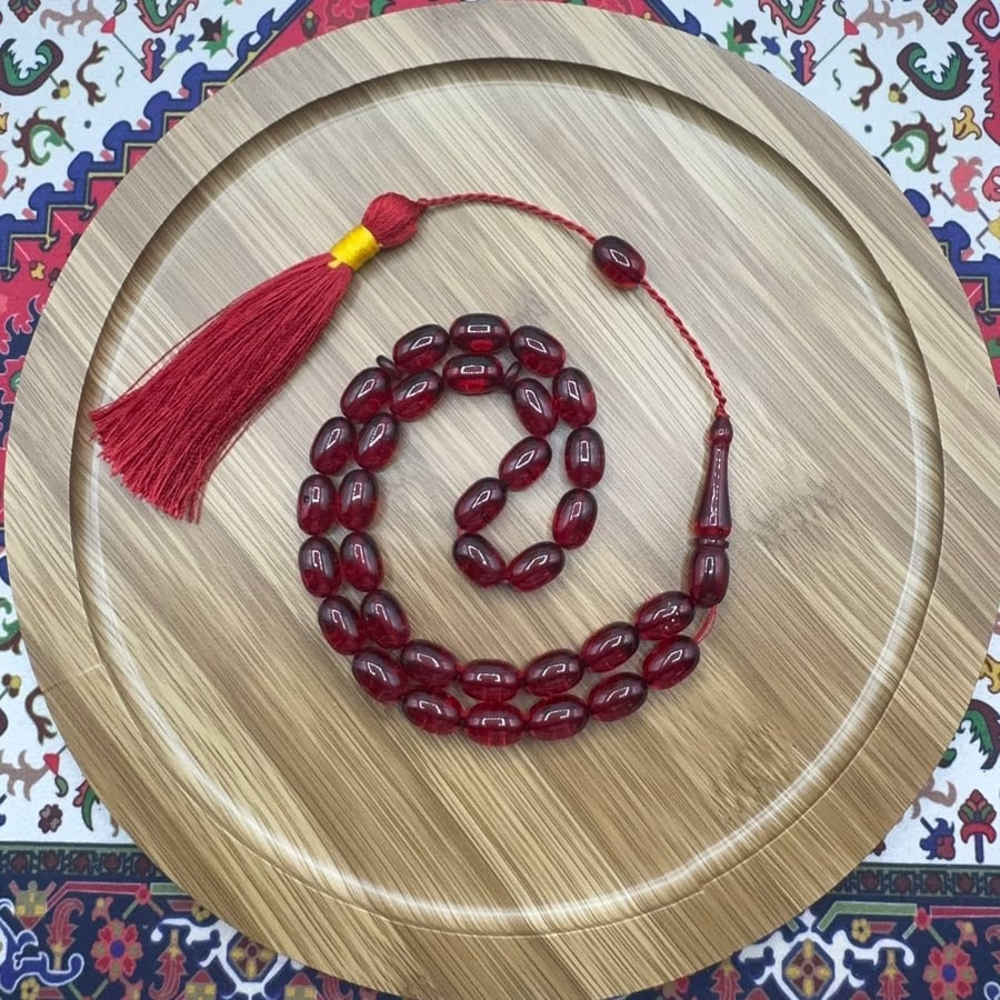 سبحة فاتوران أحمر عنّابي شفاف – 33 خرزة – كركوشة حمراء
