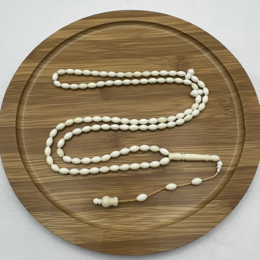 سبحة عظم جمل طبيعي ناعمة (99 خرزة) مع تمليكة حرفية
