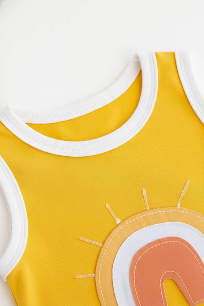 Children's summer backpack with a yellow rainbow arch design