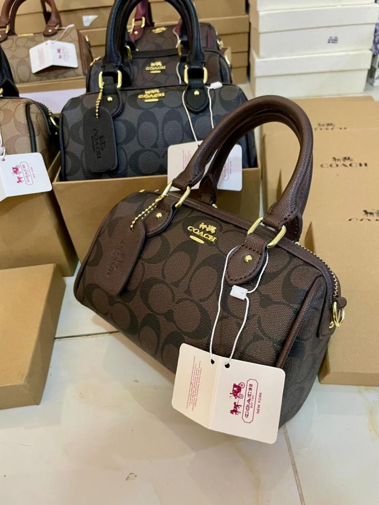 شنط ماركة كوتش ماستر