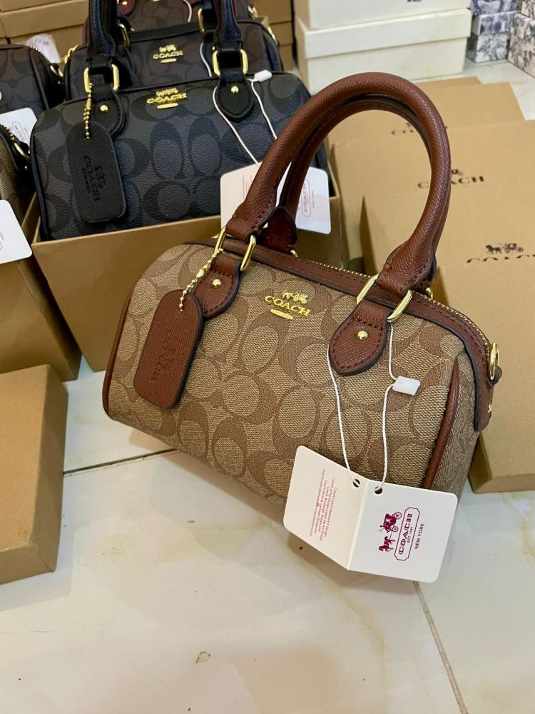 شنط ماركة كوتش ماستر