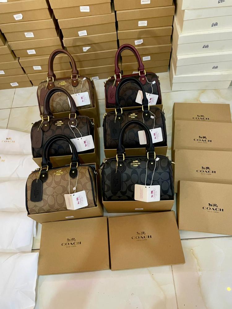 شنط ماركة كوتش ماستر