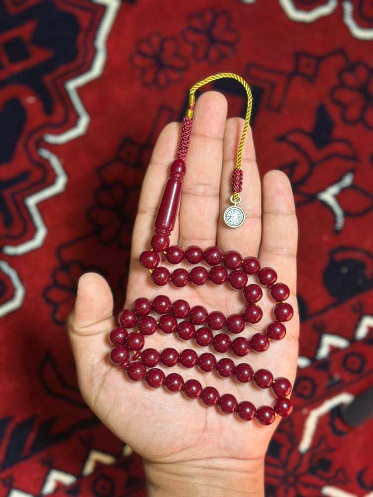 مسباح بكلايت أحمر دم غزال بكركوش الساعة