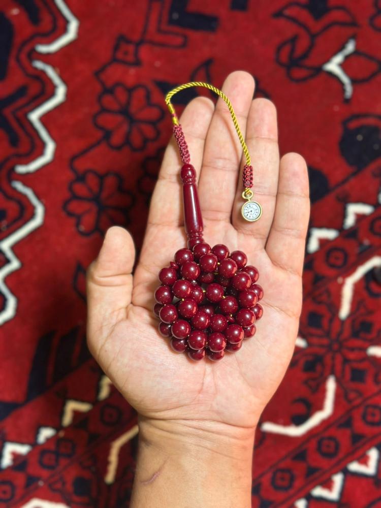 مسباح بكلايت أحمر دم غزال بكركوش الساعة