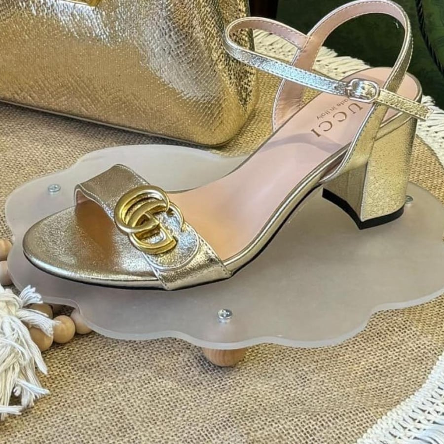 ‏Gucci