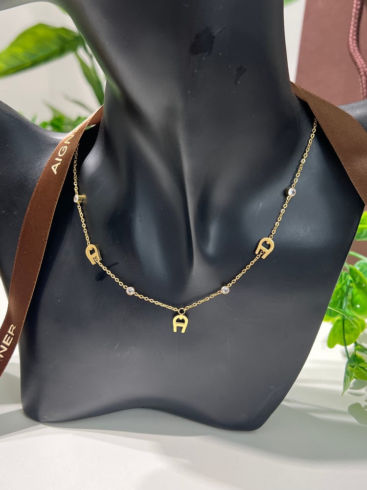 سلسال   AIGNER ذهبي
