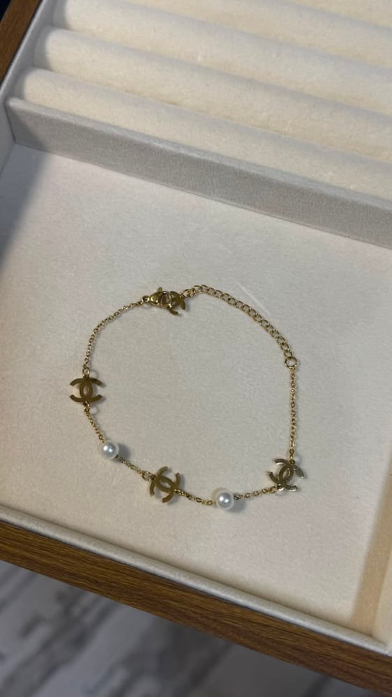 إسوارة CHANEL فضي وذهبي