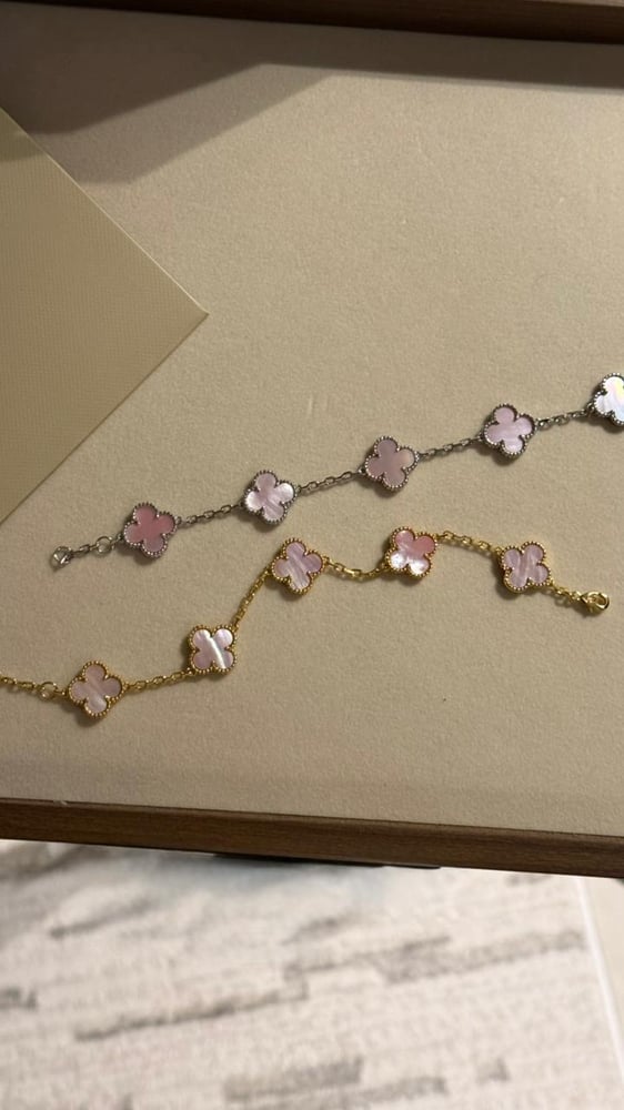 إسوارة Van cleef ذهبي - فيروزي مخطط