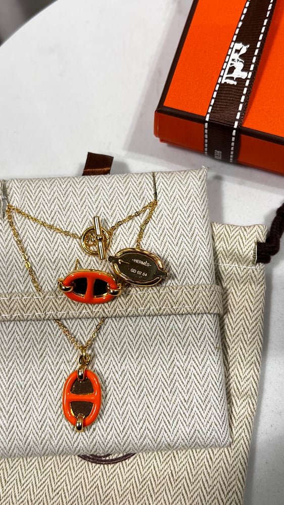 سلسال + حلق hermes ذهبي - برتقالي