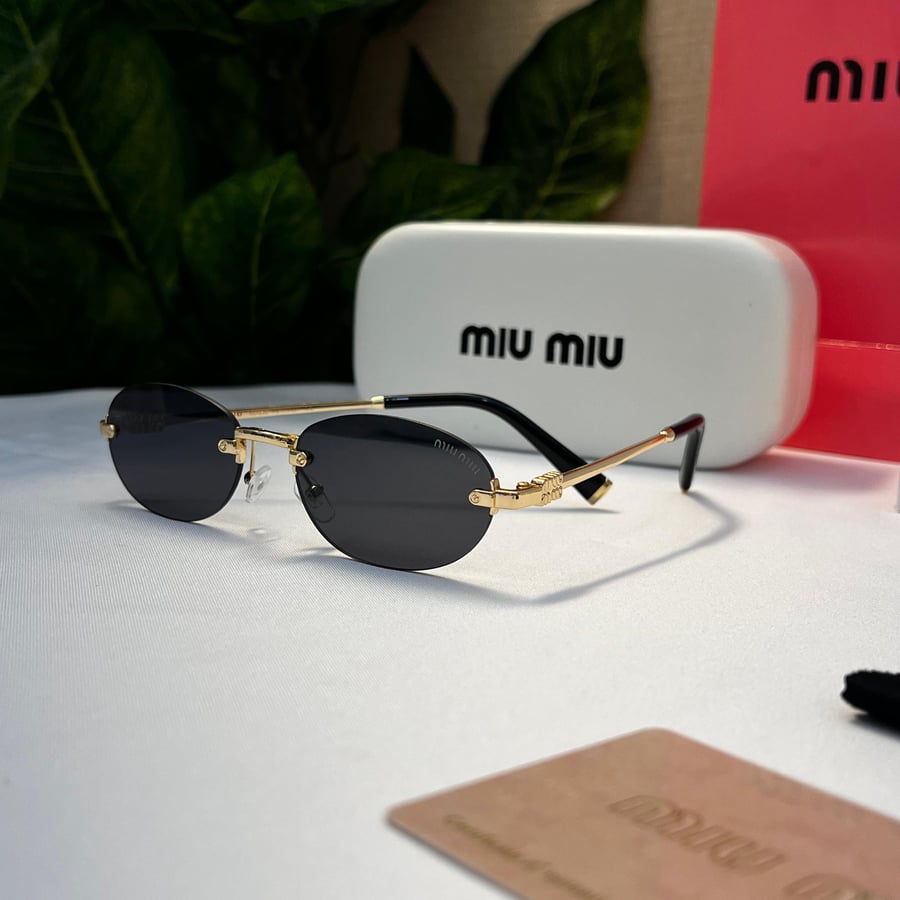 نظارة miu miu أطار ذهبي عدسة أسود