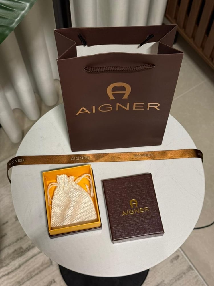 إسوارة AIGNER ذهبي