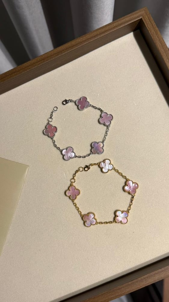 إسوارة Van cleef ذهبي - فيروزي مخطط