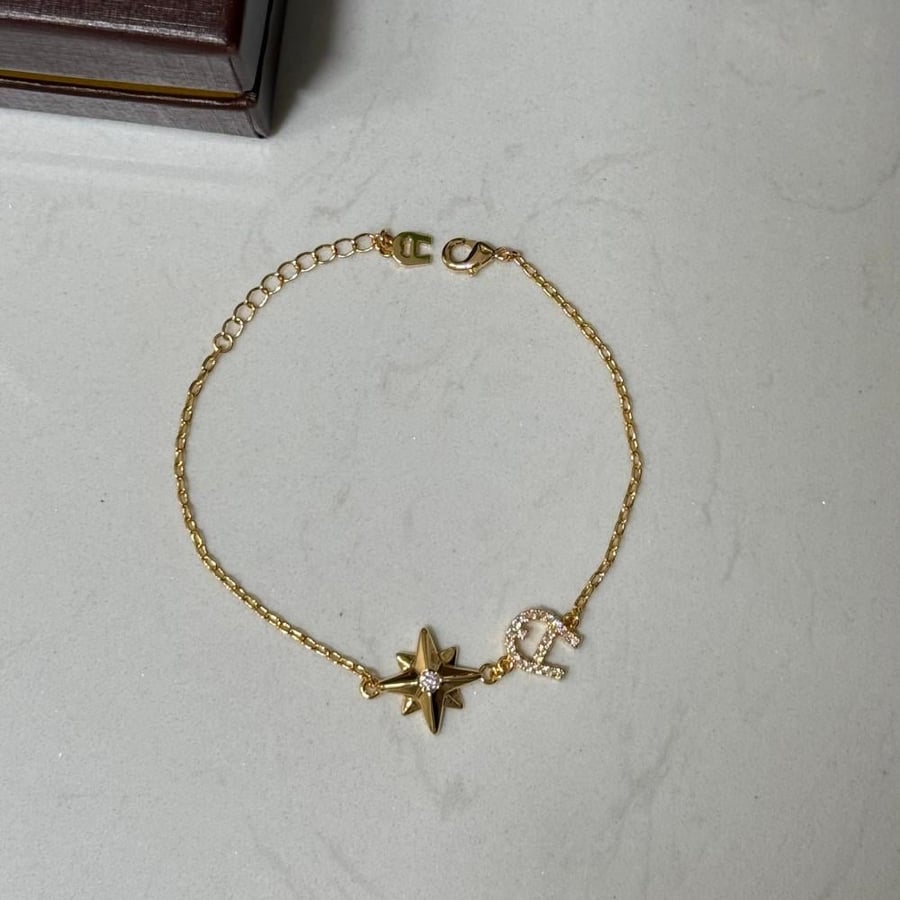 إسوارة AIGNER ذهبي