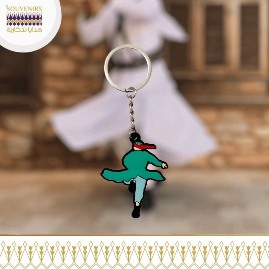 ميدالية بتصميم يجسد رقصة المجرور التراثية السعودية