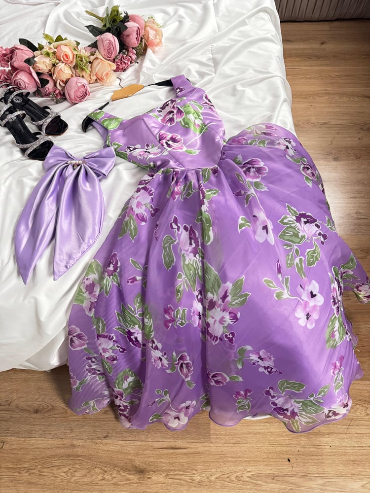 Evening dress with a floral fabric