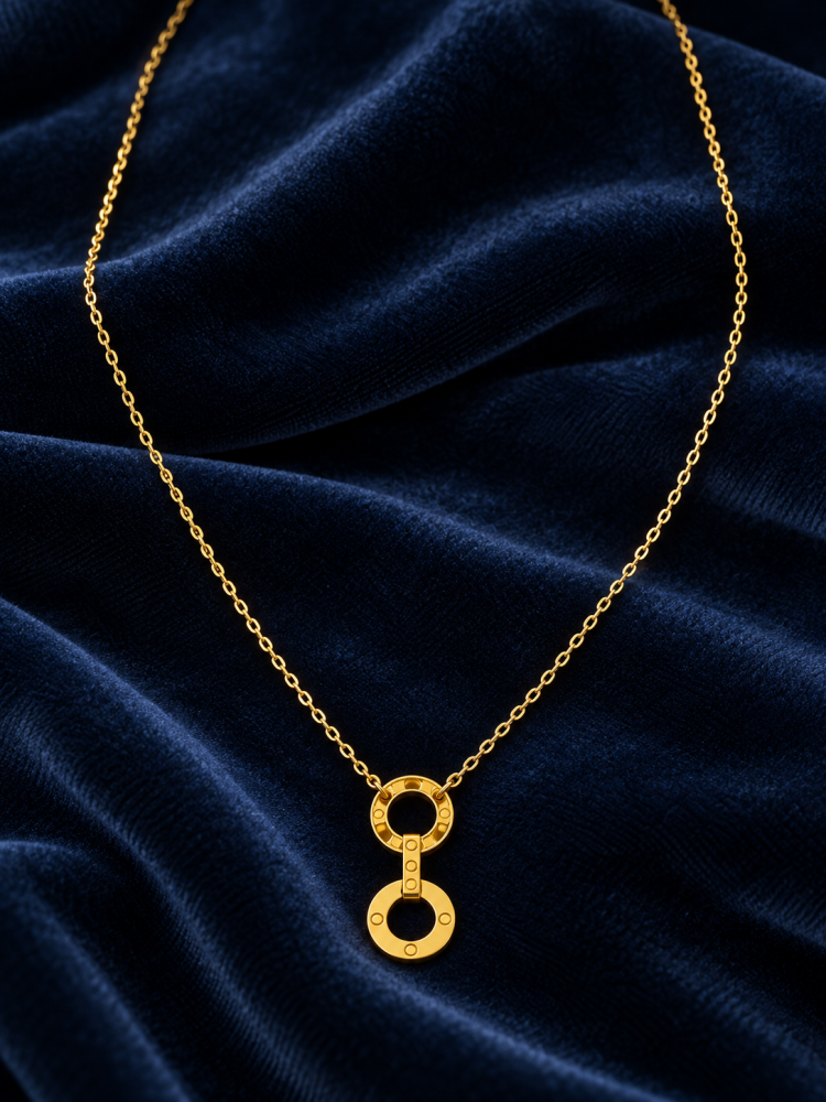 21-karat gold necklace, delicate, weighing 0.93 grams, with circles.