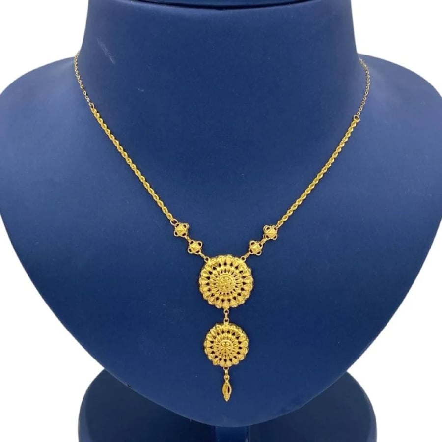 Jaber chair necklace, 21 karat gold, weighing 2.9 grams