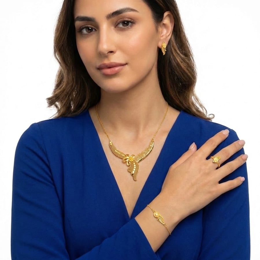 21-karat gold set, weighing 9.71 grams