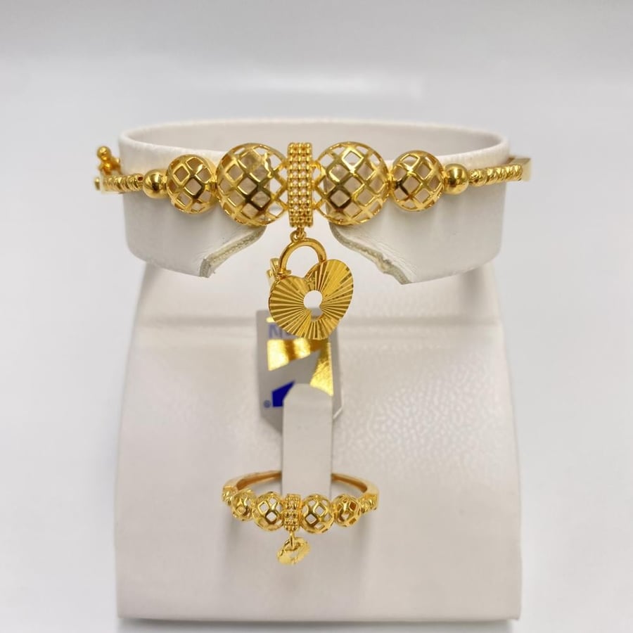 Bracelet with ring, 21 karat gold, weight 12.06 grams