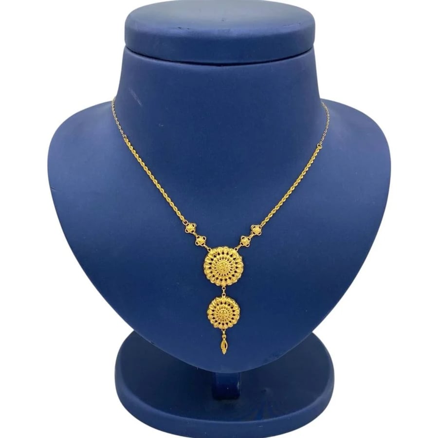 Jaber chair necklace, 21 karat gold, weighing 2.9 grams
