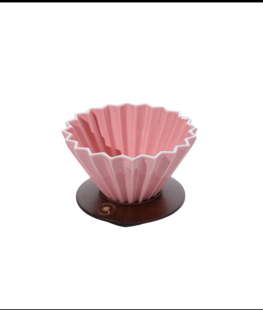 V60 cone made of ceramic with a wooden base in a classic design