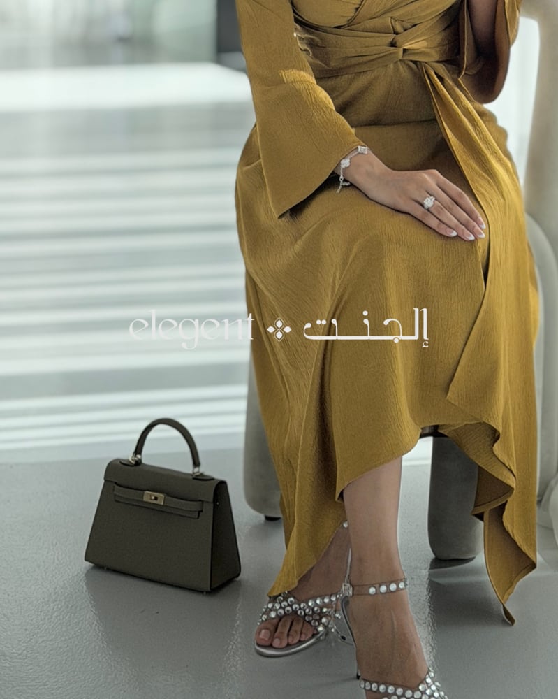 كيلي جلد طبيعي باللون العنبر